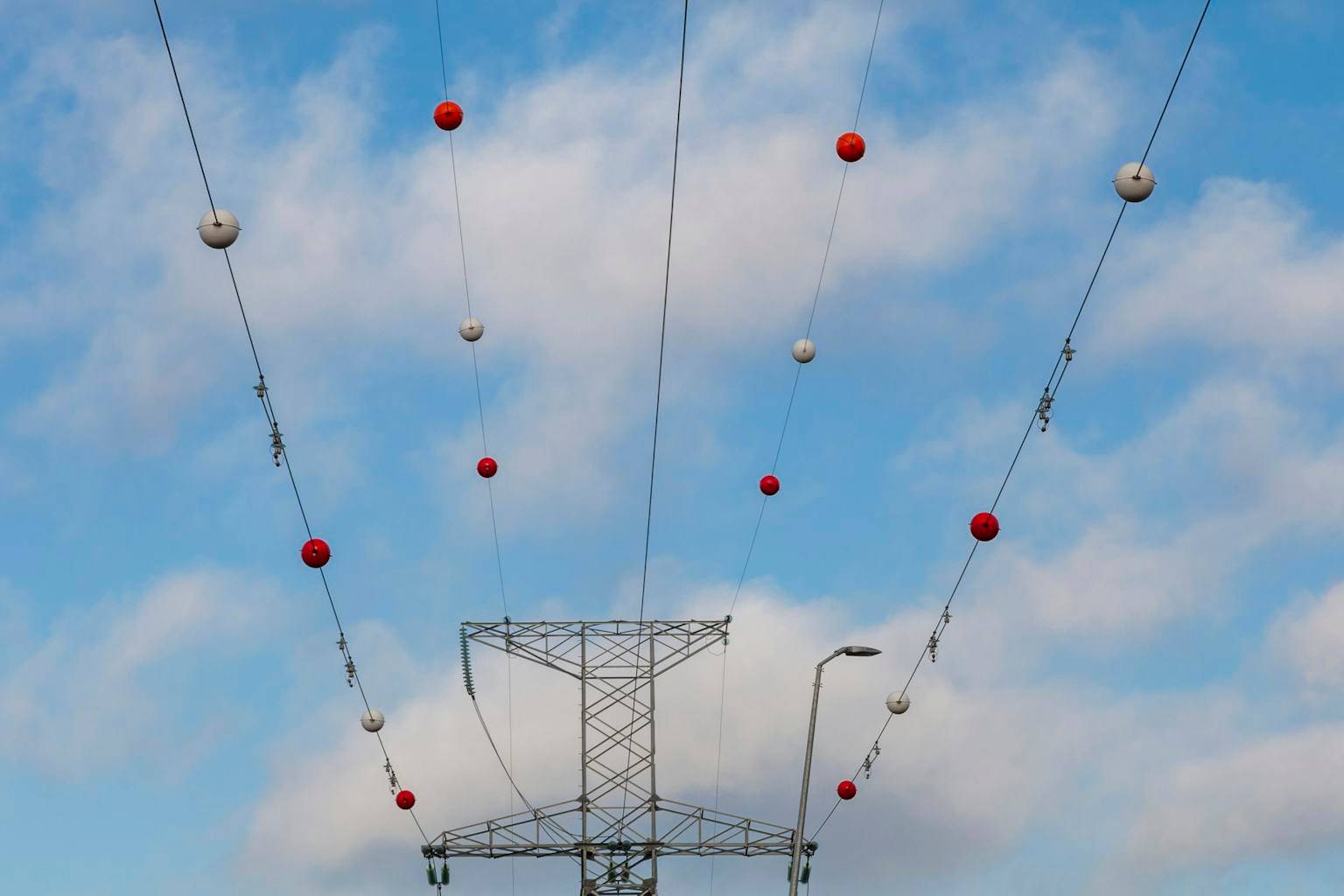 What Are Those Orange Balls On Some Power Lines?